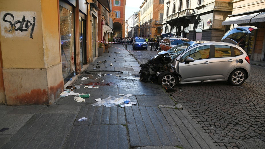 driver-identified-after-car-plows-into-crowd-injuring-8;-passerby-stabbed